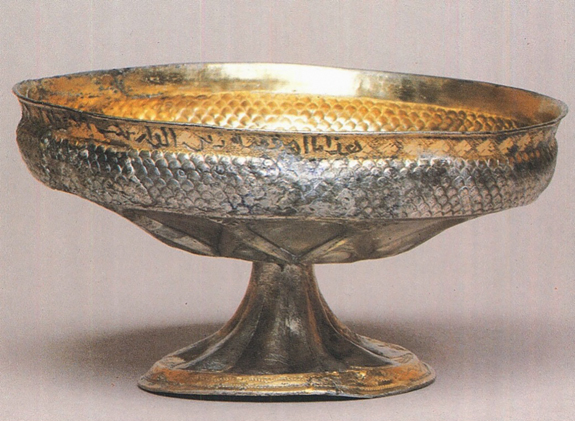 Figure 27.1. The side view of a wide-bowled gilt cup, footed, with a broad, cross-hatched decorative band encircling the lip.
