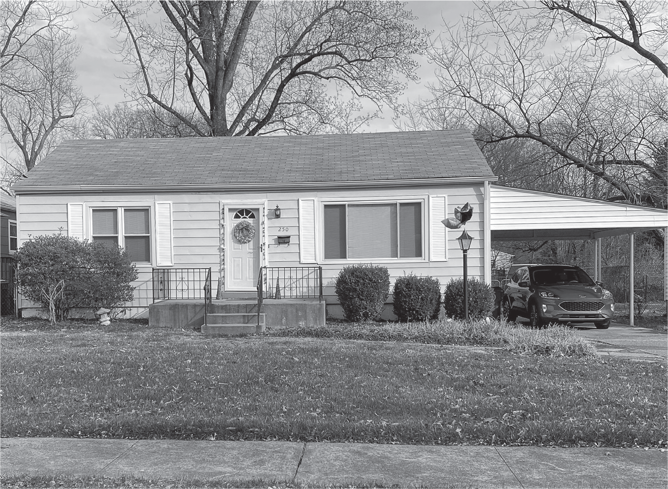 Figure 13.7: A photograph of a typical modest one-story ranch house built in Ferguson after World War II.