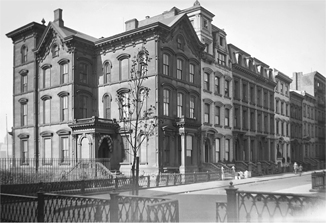 Figure 1.4. A photograph of a row of imposing four-story nineteenth-century mansions and row houses in Brooklyn Heights.
