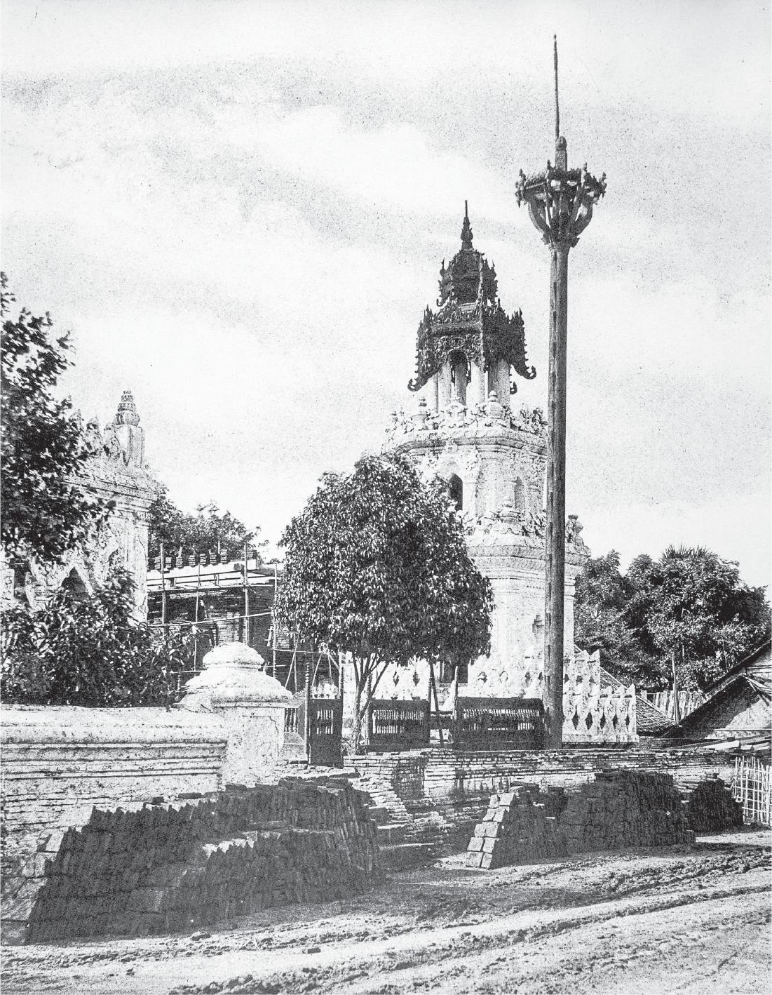 The black-and-white photograph shows a street view of a mosque in Amarapura.