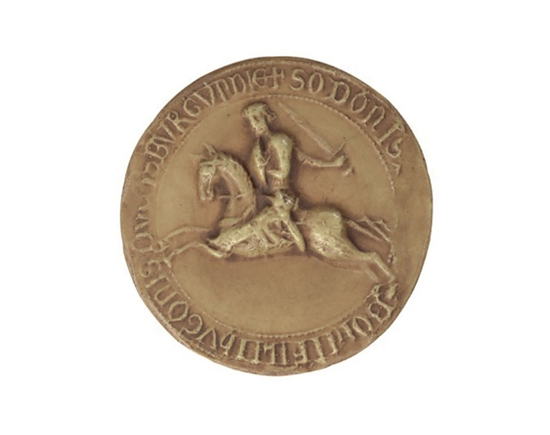 Figure 13.1. A round, beige-colored seal featuring a knight on horseback with a sword, encircled by letters and symbols around the seal’s edge.