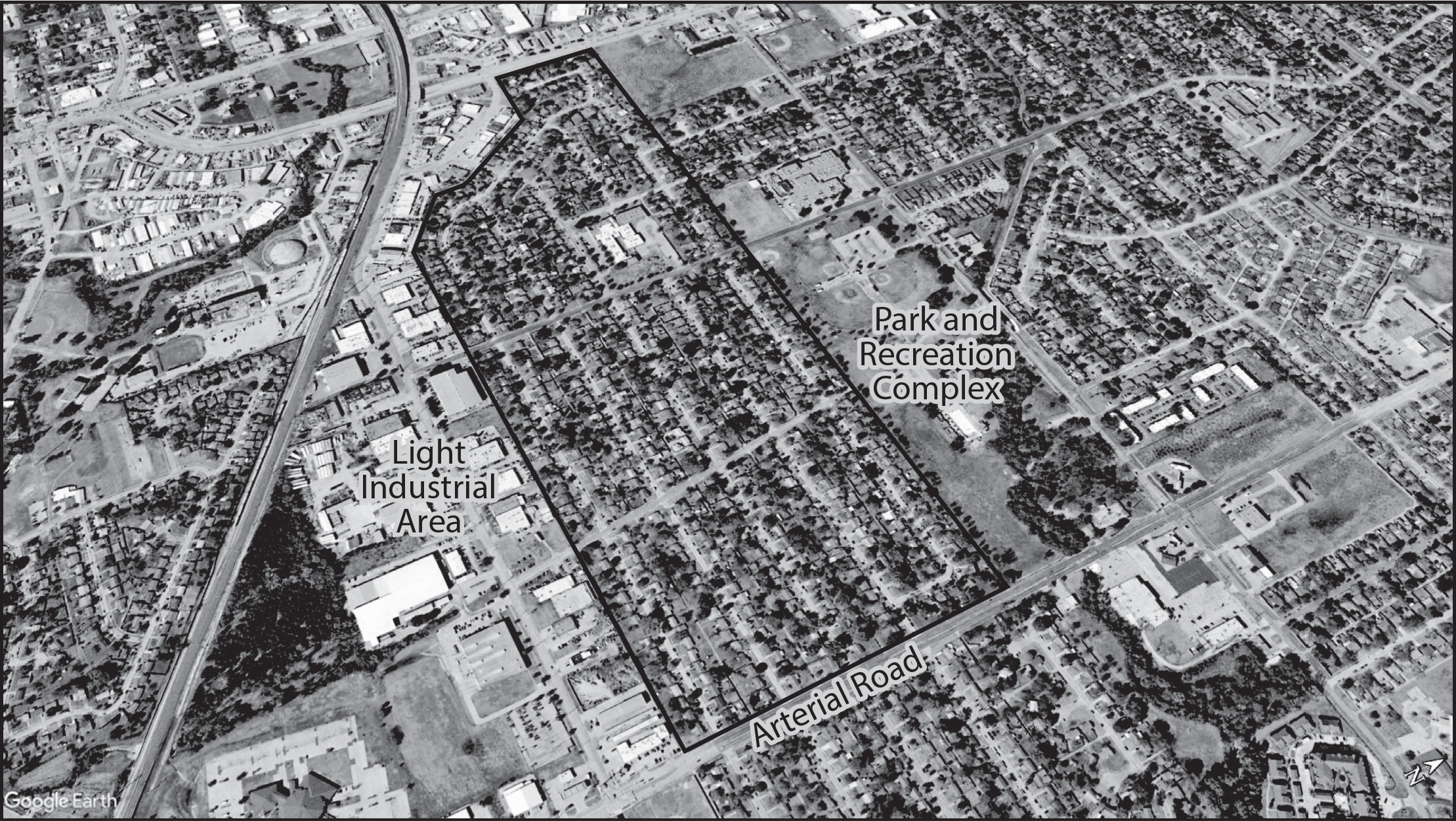 Figure 5.4: An aerial photograph of a neighborhood in Garland, Texas, showing how its borders are defined by a park, a light industrial area, and an arterial road.