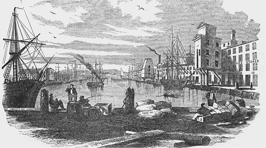 Figure 3.2. A ground-level view of the Atlantic Basin includes piles of cargo on the foreground dock, where several men smoke and converse, and another fishes. Stretching into the dis//tant background are ships, a rowboat, and the warehouses and grain silos that line the basin.