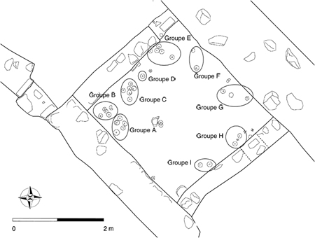 Figure 12.5. A foundation plan for Room 45 at Bi’r Samut with position of the loom weights indicated with circles.