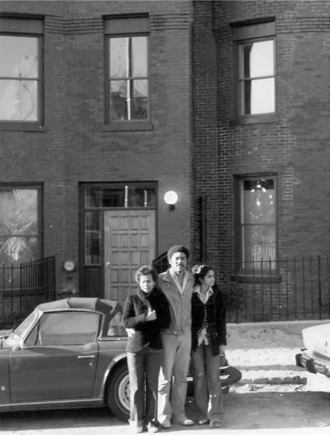 Figure 9 / Addie’s cousin, Tom, and Addie (left to right) in front of brownstones nearing completion, fall 1977