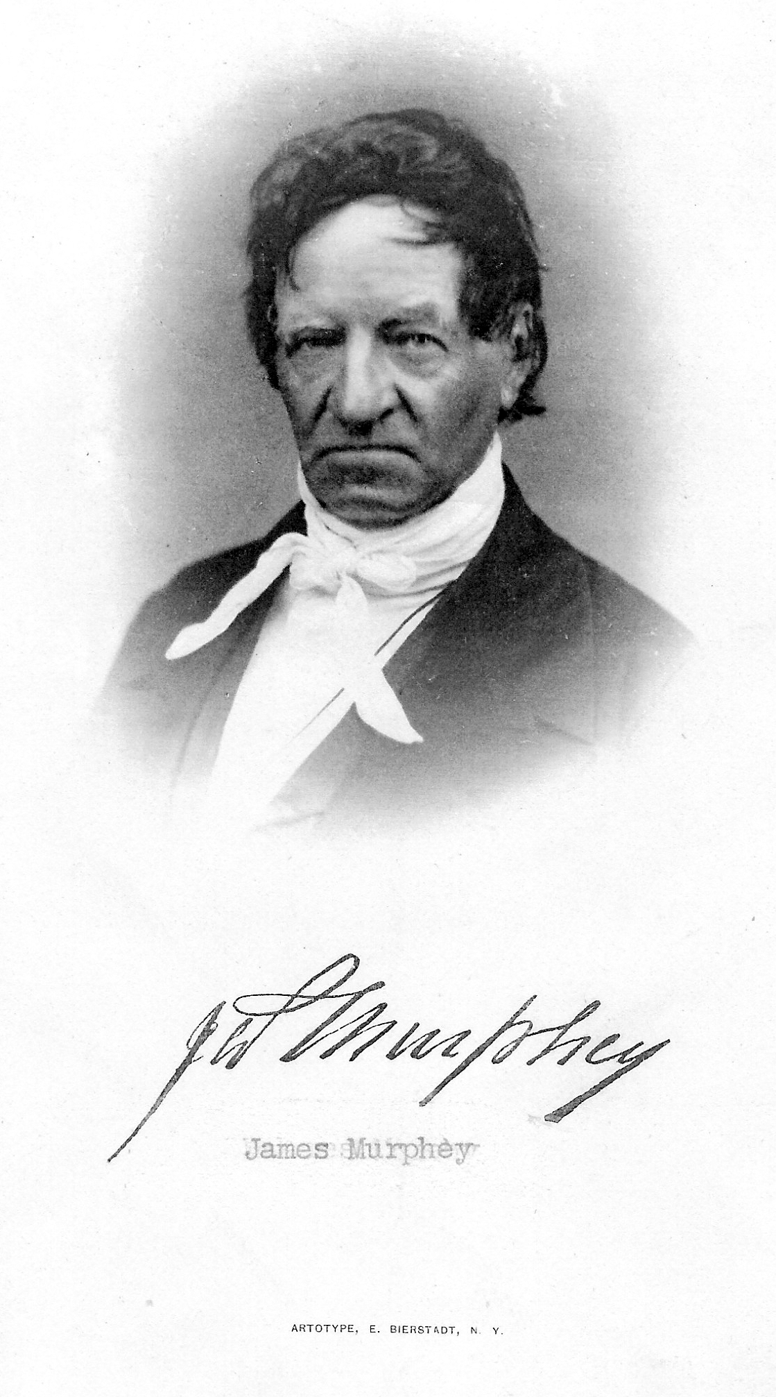 A man with dark hair and a stern face looks in the camera. He wears a white shirt, a white neckcloth, and a black jacket.
