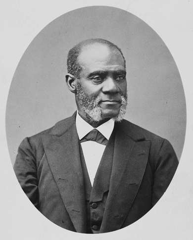 A middle-aged Black man is dressed in a well-fitting suit that sits comfortably and squarely over a crisp white shirt. Well-trimmed and graying muttonchops frame a strong, clean-shaven chin. No mustache obscures a wide, firm mouth. Garnet's glance, below a high, unfurrowed brow, is confident and calm.