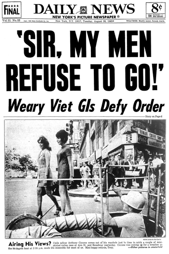 Figure 32. The front page of the Daily News with the headline “Sir, my men refuse to go! Weary GIs Defy Order” Below is a photo of a utility man looking out of a street hole at two passing young women with the caption “Airing His Views?”