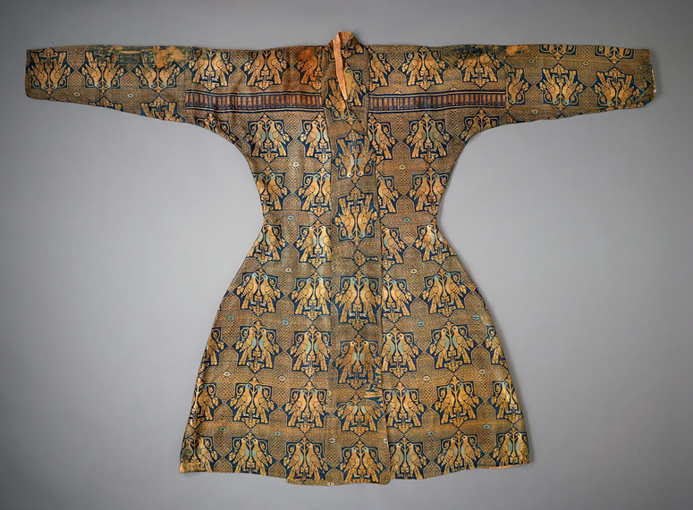 Figure 19.1. A long sleeved, high collared, three-quarter length robe made of gold-threaded cloth featuring a repeating motif of paired hunting birds.