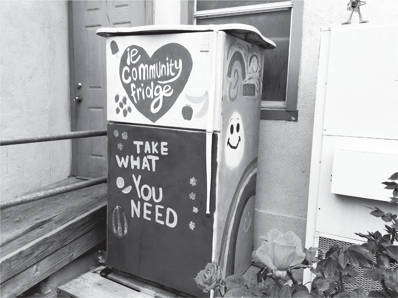 Figure 0.1: A community refrigerator in Colton, California, with the painted legend “Take what you need.”
