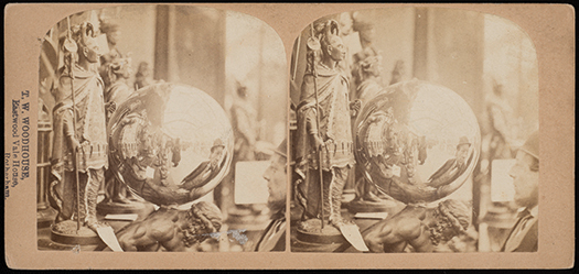 Figure 3.4. A shiny metal ball, part of a sculpture of Atlas, acts as a fish-eye lens by reflecting the exhibits and spectators at the exhibition.