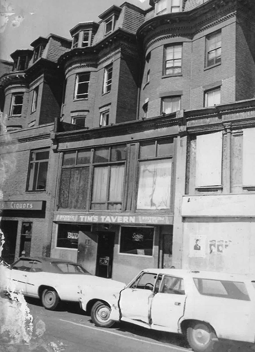 Figure 6 / Boarded-up brownstones purchased from the Boston Redevelopment Authority, October 1976 (front view)
