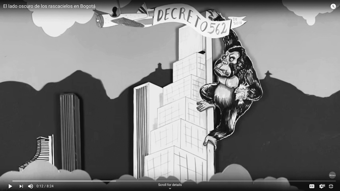 Figure 5.4. A still image from a video depicts a large gorilla climbing a building, with a plane flying by carrying a banner that reads “DECRETO562.”