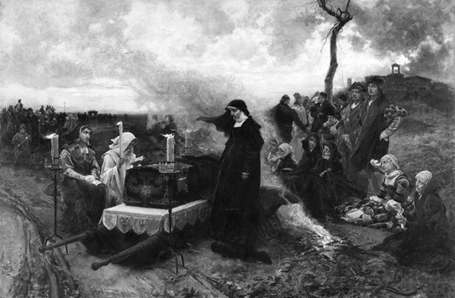 An outdoor scene of a desolate countryside on a gray overcast day; at center, a coffin draped in a luxurious black cover with royal insignia is watched by a nun, while a white-robed friar prays over the coffin, and a female figure in richly embroidered robes looks on dispassionately, while disconsolate courtiers and clerics watch from the right, and a large procession of indistinct figures, winds behind on the left.