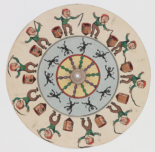 Figure 5.7. A boy in a cap and jacket with a ruffled collar sticks out his tongue while lashing a top to make it spin in circles. Beneath him, a black devilish imp performs cartwheels around the circle of the disk.