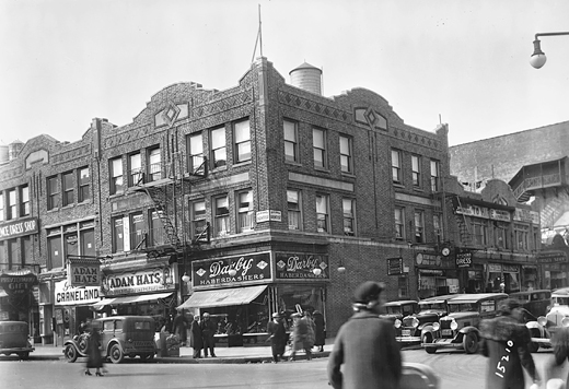 Figure 6.3. A photograph of the corner of Pitkin and Saratoga avenues in Brownsville shows a commercial district with two stories of apartments and offices above street-level stores.