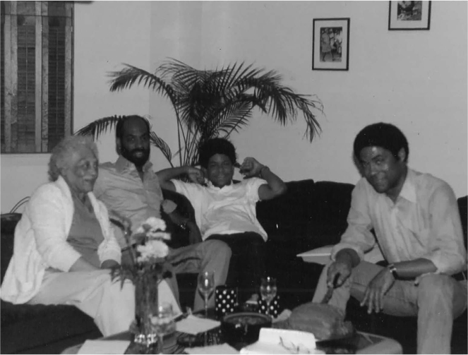 Figure 11 / Tom’s mother, Charles McLean, Nigel, and Tom (left to right) in renovated apartment, October 1978