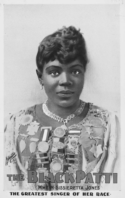 A head-and-shoulders portrait of a black woman adored by many medals. The bottom of the poster is inscribed, “The Black Patti: The Greatest Singer of Her Race.”
