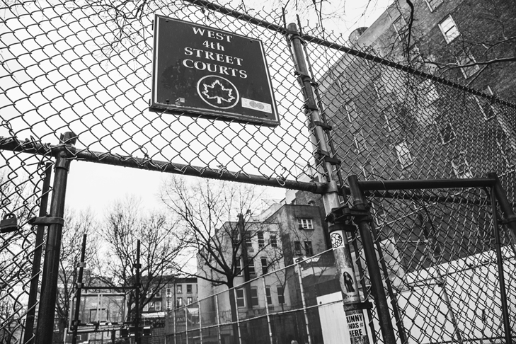 High chain-link fences define the streetball courts on Manhattan’s West Fourth Street known as the Cage.